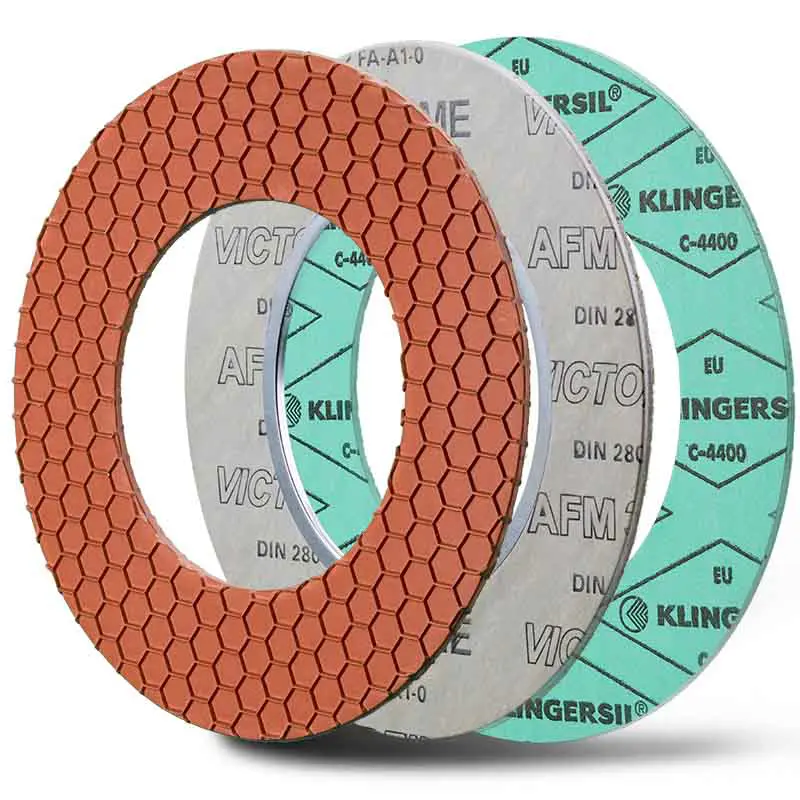 Abbildung zeigt eine Gylon® Epix Style 3501-E wie zwei Faserstoffdichtungen einmal die Victor Reinz® AFM 34/2 CO mit Innenbördel und die Klingersil® C-4400. The figure shows a Gylon® Epix Style 3501-E and two fibre gaskets one Victor Reinz® AFM 34/2 CO with inner eyelet and one Klingersil® C-4400.
