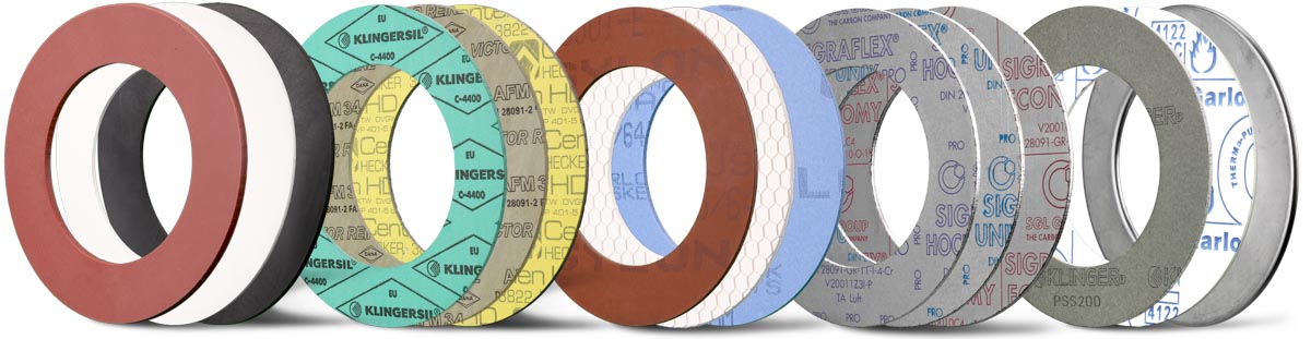 Deutsch: Abbildung zeigt eine Übersicht von möglichen Flachdichtungsqualitäten (von links nach rechts) Gummi, Faserstoff, PTFE, Graphit und Hochtemperatur Flachdichtungsmaterialien. English: Illustration shows an overview of possible flat gasket qualities (from left to right) rubber-, fibrous-, PTFE-, graphite- and high temperature flat gasket materials.